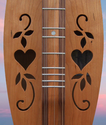 Dulcimer Sounholes at https://gibsondulcimers.com/dulcimer_soundholes.html