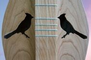 Dulcimer Sounholes at https://gibsondulcimers.com/dulcimer_soundholes.html