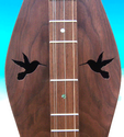 Dulcimer Sounholes at https://gibsondulcimers.com/dulcimer_soundholes.html